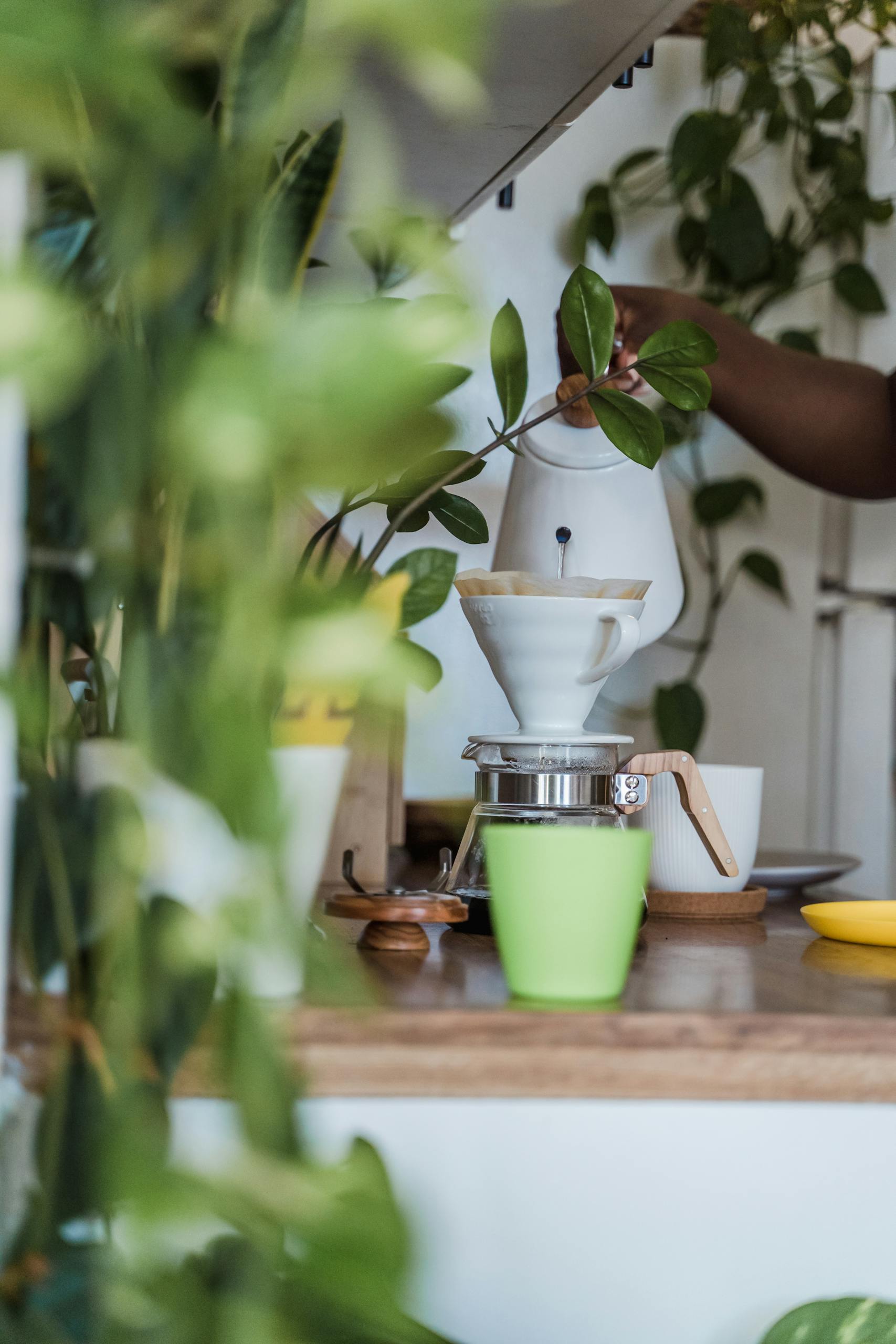 Hand Holding Kettle